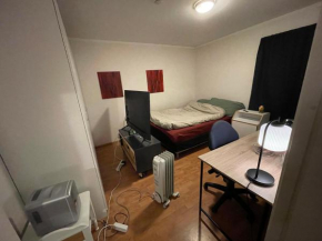 Cozy single room bedroom